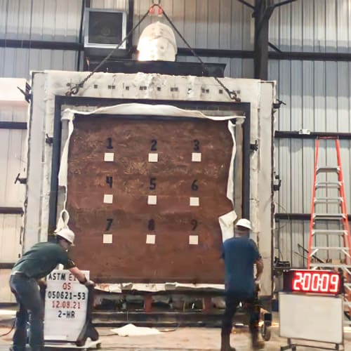 What is Natural Building? - Fire testing cob wall